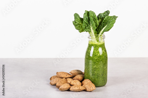 Obraz na płótnie Smoothies with almond milk and chlorophyll. Healthy food concept w salonie