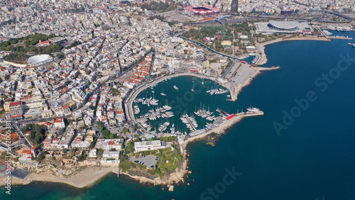 Aerial drone photo of iconic round shaped picturesque port of Mikrolimano with anchored sail boats and yachts after renovation, Piraeus, Attica, Greece photo