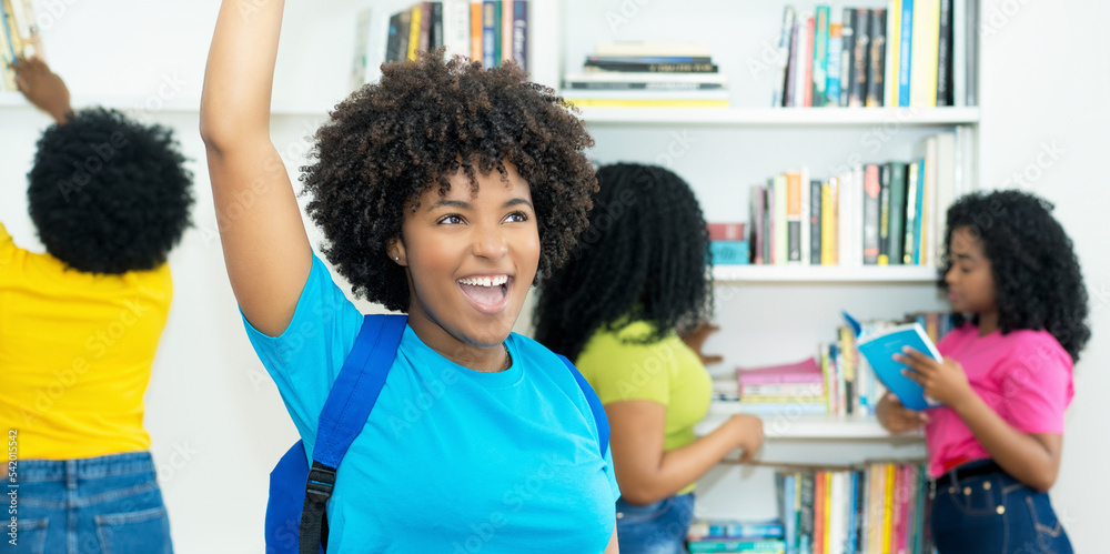 Successful black female student with group of african american college students Successful black female student with group of african american college students