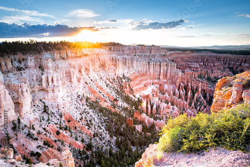 Aerial high angle view of Bryce Point overlook of orange colorful hoodoos red rock formations in Bryce Canyon National Park at summer sunset