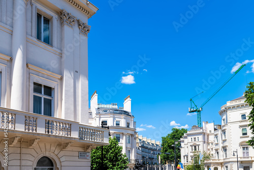 Tablou canvas Looking up view of Belgrave square in Belgravia or Mayfair, London UK street wit