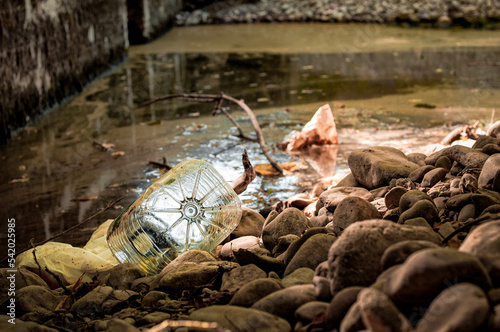 Pollution and garbage accumulate on the banks of the Baia river, Erriberabeitia, Araba - Alava, Basque Country
 photo