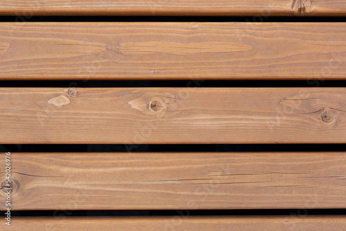 Fototapeta Naklejka Na Ścianę i Meble -  A wooden bench made of planks (top view) for the background. Wooden texture.