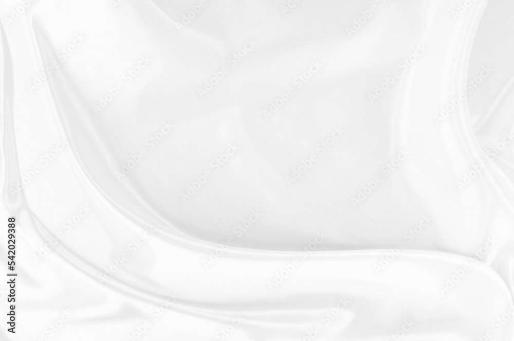 White gray satin texture that is white silver fabric silk background with beautiful soft blur pattern natural.