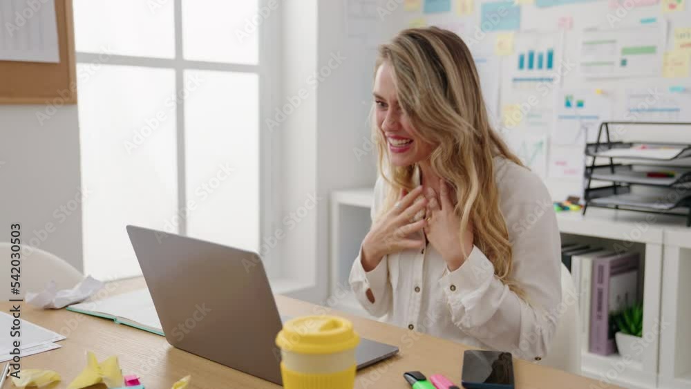 Young blonde woman business worker having video call at office Young blonde woman business worker having video call at office