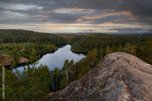 Northern landscape, blue lakes among the Spruce forest. The nature of the Karelian Isthmus and the rocks of the Triangular Lake, view from the top 