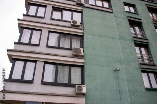 Air conditioning on the windows of a tall building