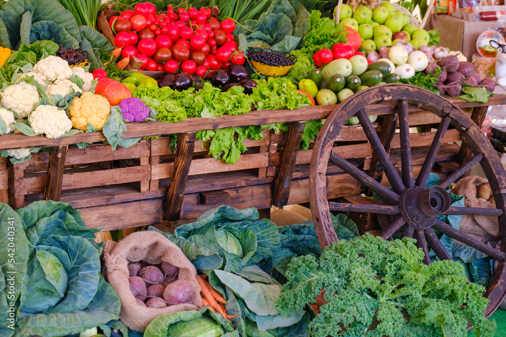 Wooden cart with various vegetables