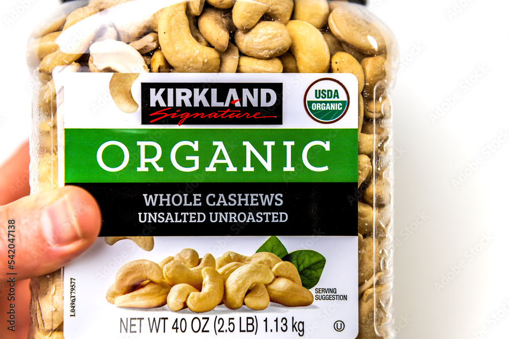 Naples, USA October 21, 2021 Closeup macro hand holding Kirkland