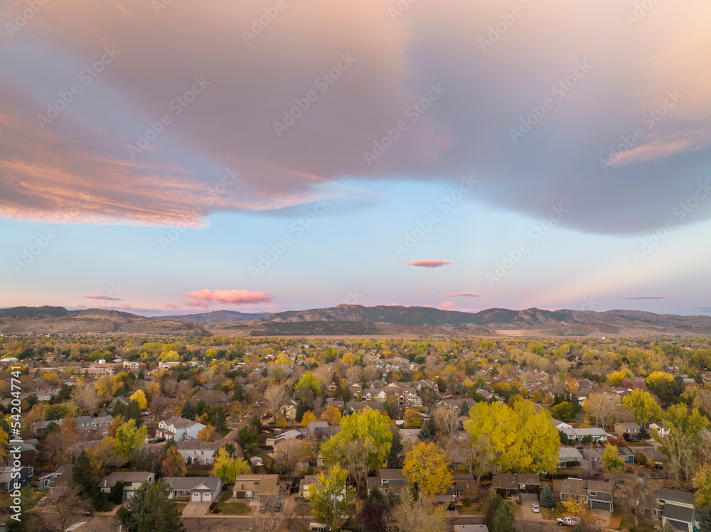 October dawn over Fort Collins and foothills of Rocky Mountains in northern Colorado, aerial view