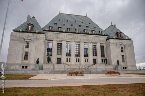 Facade of the Supreme Court of Canada building in autumn.