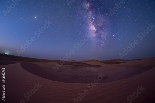 Milky way in desert above sand dune, empty quarter, Abu Dhabi, UAE.