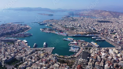 Aerial drone cinematic video of busy port of Piraeus, the largest in Greece and one of the largest passenger ports in Europe as seen from high altitude, Attica, Greece  photo