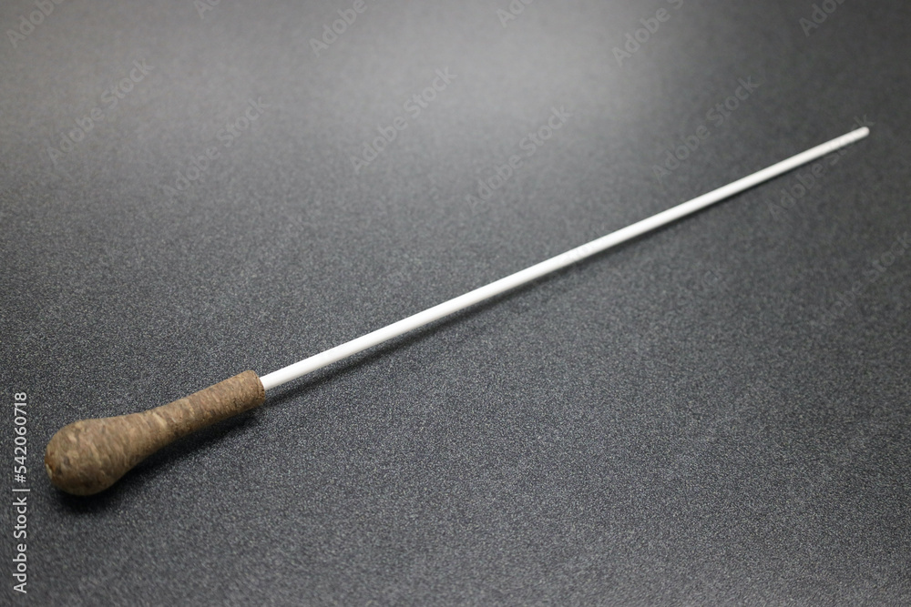 Conductor's Baton isolated on black background Conductor's Baton isolated on black background