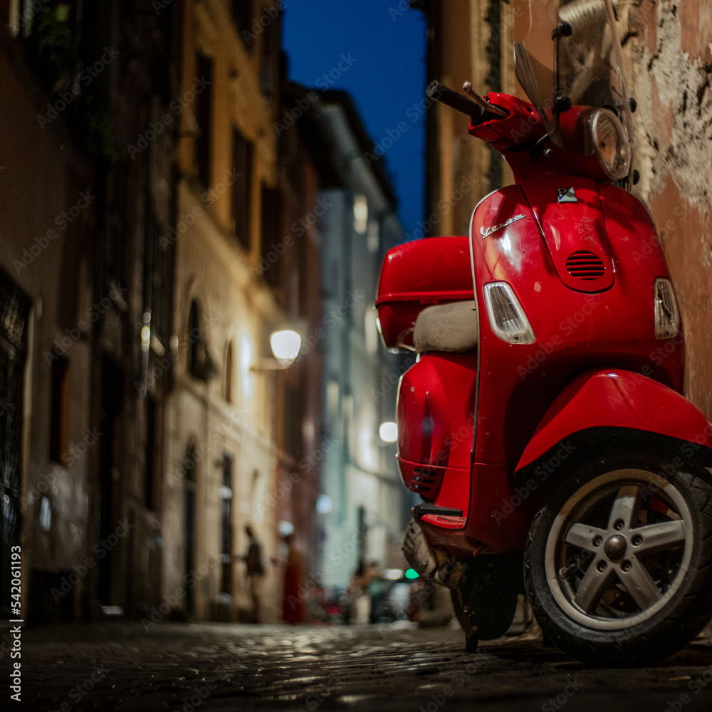 red scooter on the street