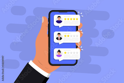 Hand holding phone with review rating. User reviews with good and bad rate on smartphone screen. Customer feedback review experience rating. Clients choosing satisfaction rating and leaving reviews