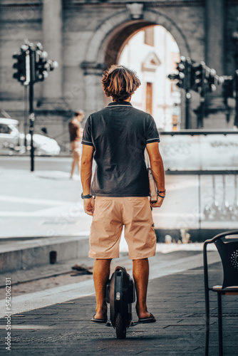 Photography person on unicycle in rome
