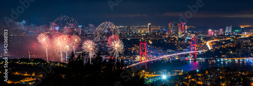 Fireworks over Istanbul Bosphorus during Turkish Republic Day celebrations. Fireworks with 15th July Martyrs Bridge (Bosphorus Bridge). Istanbul, Turkey. © resul