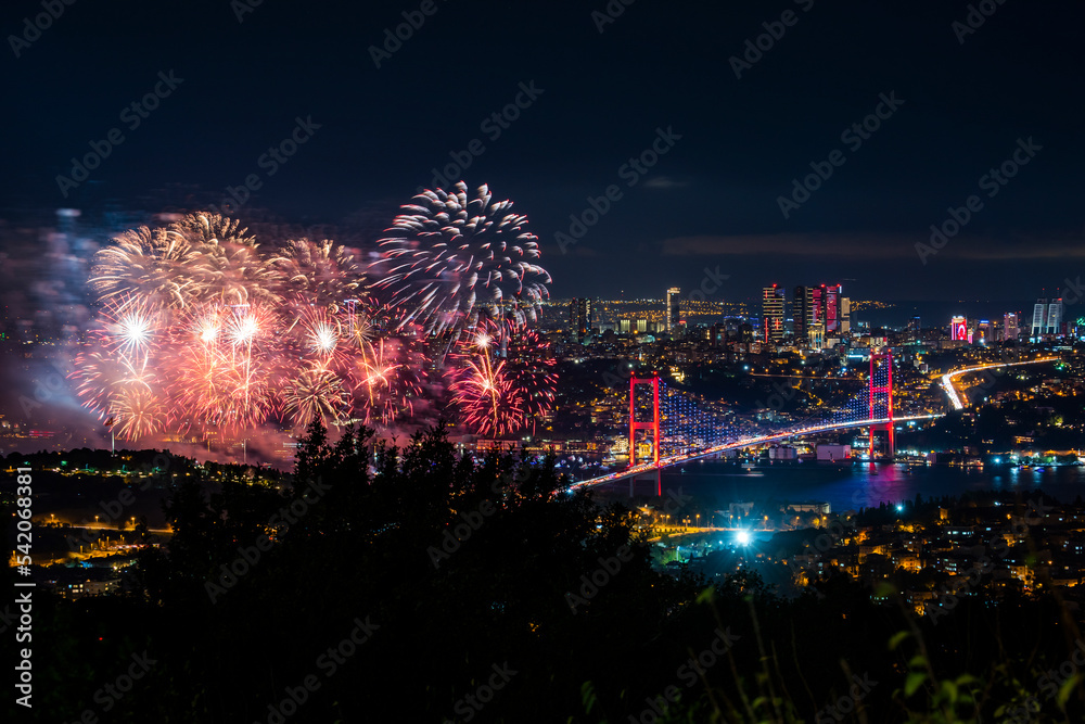 Fireworks over Istanbul Bosphorus during Turkish Republic Day celebrations. Fireworks with 15th July Martyrs Bridge (Bosphorus Bridge). Istanbul, Turkey. Fireworks over Istanbul Bosphorus during Turkish Republic Day celebrations. Fireworks with 15th July Martyrs Bridge (Bosphorus Bridge). Istanbul, Turkey.