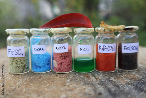 Colored chemicals, inorganic salts of metals: iron, copper, cobalt, nickel, for interesting experiments. photo