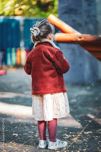Fototapeta Naklejka Na Ścianę i Meble -  little beautfiul child playing on the playground in varna bulgaria , model shooting 