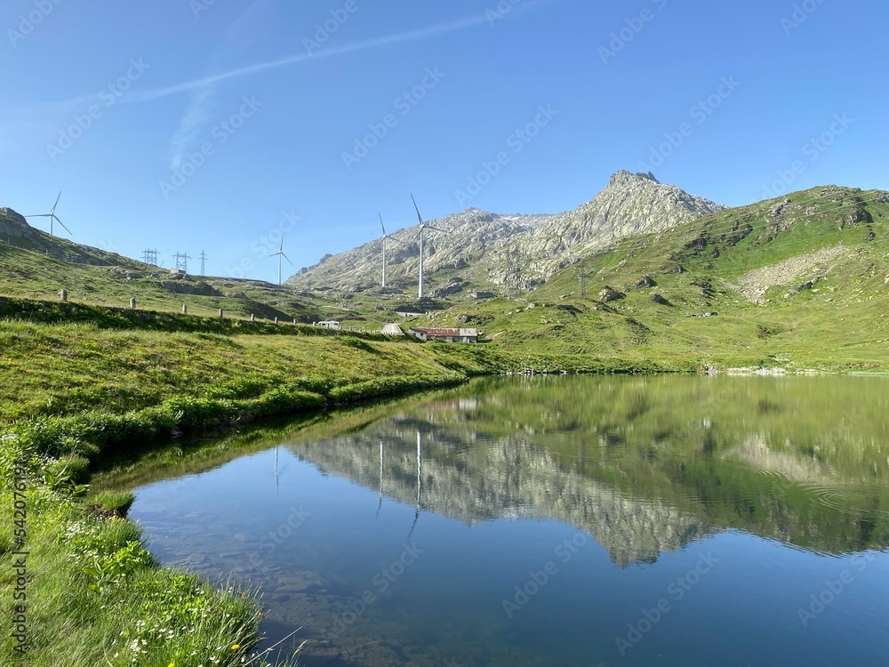 Summer atmosphere on the Lago di Rodont lake (Lake Rodont) in the Swiss alpine area of the mountain St. Gotthard Pass (Gotthardpass), Airolo - Canton of Ticino (Tessin), Switzerland (Schweiz)