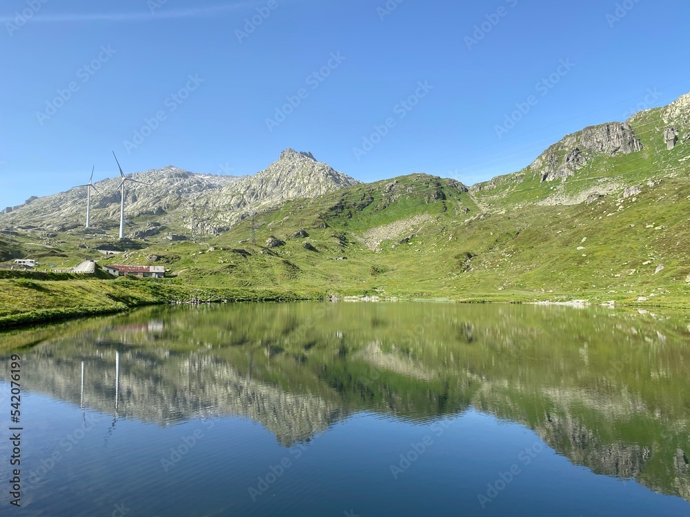 Summer atmosphere on the Lago di Rodont lake (Lake Rodont) in the Swiss alpine area of the mountain St. Gotthard Pass (Gotthardpass), Airolo - Canton of Ticino (Tessin), Switzerland (Schweiz)