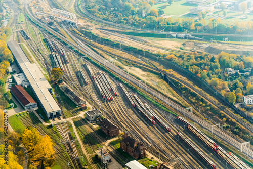 Vast advanced railway station in Warsaw, Poland seen from aerial perspective. Human interference in nature. Transportation concept. High quality photo
