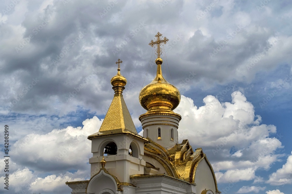 Golden domes of orthodox church. Khabarovsk, St. Seraphim of Sarov Church. Far East, Russia.