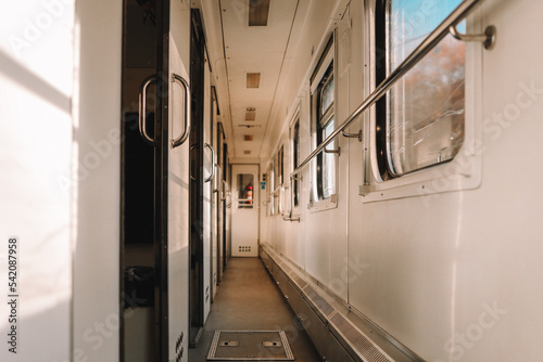 Train wagon inside. Passenger train interior. Comfortable sleeping train compartments