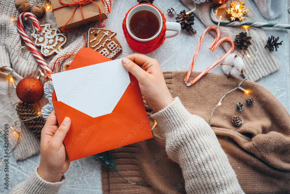Fototapeta premium Girl Writing Letter to Santa at Christmas