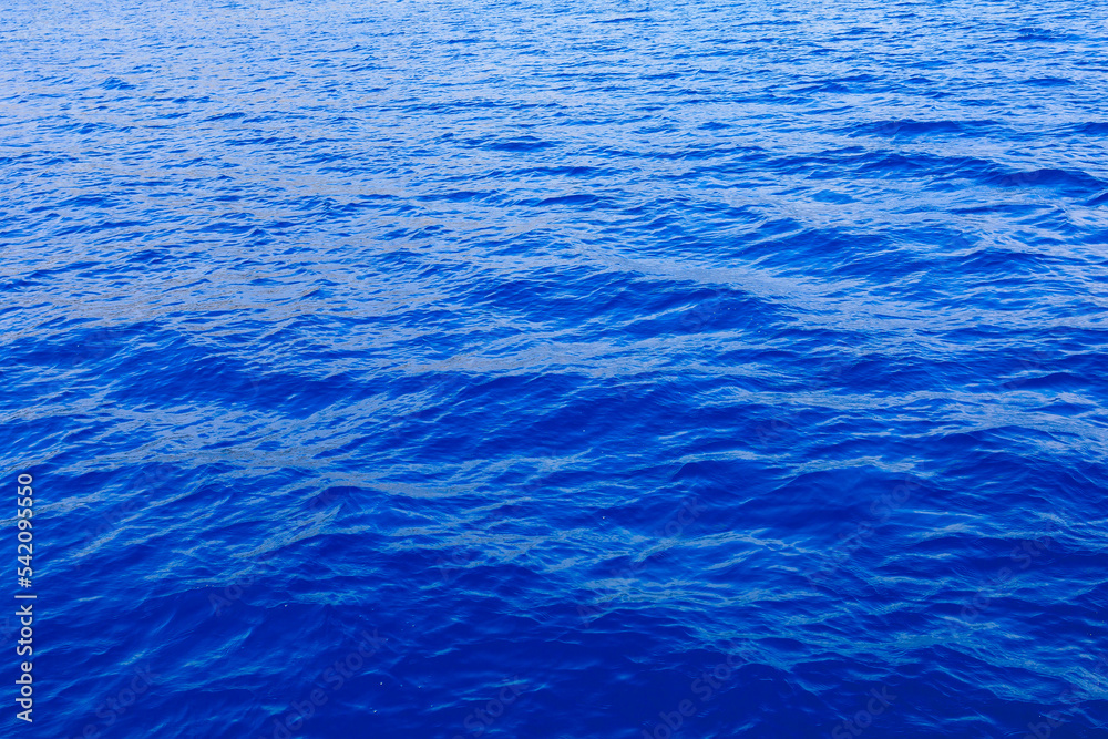 Very nice sea water background or backdrop with selective focus. Small waves of natural water surface texture. Very nice sea water background or backdrop with selective focus. Small waves of natural water surface texture.