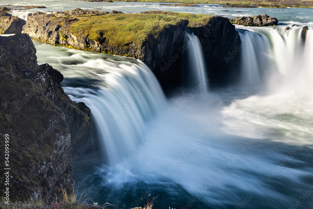 Godafoss Waterfall in Iceland is nicknamed the Waterfall of the Gods. Some believe that the name comes from the fact that the waterfall is god-like in beauty. Godafoss Waterfall in Iceland is nicknamed the Waterfall of the Gods. Some believe that the name comes from the fact that the waterfall is god-like in beauty.