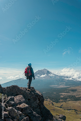 a climber on a summit freedom