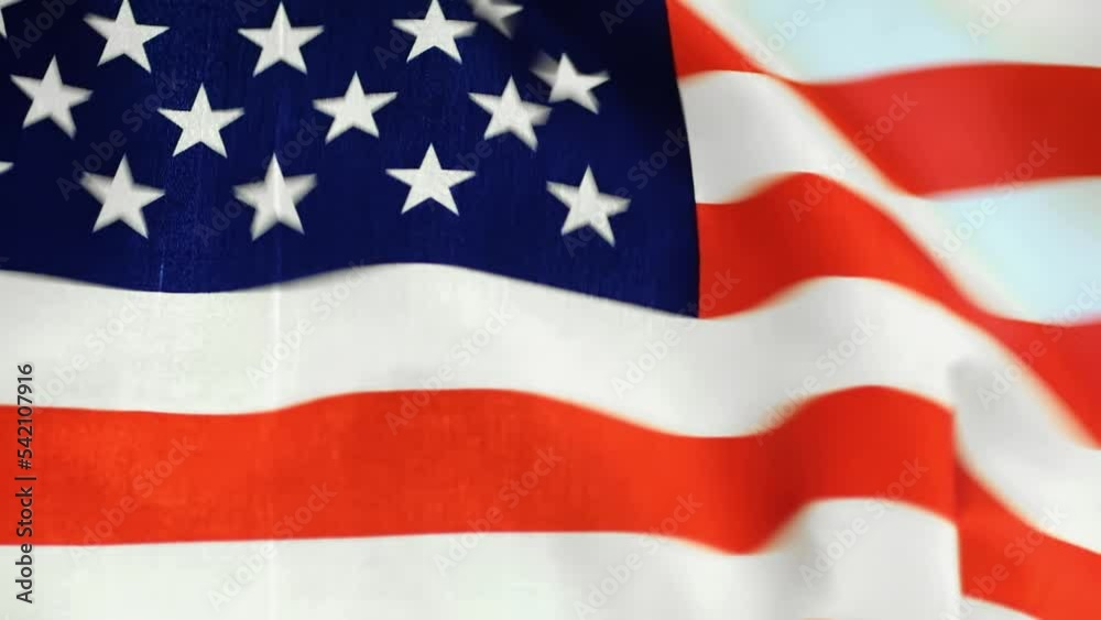 Video of American USA flag waving on the wind on black background. Video of American USA flag waving on the wind on black background.