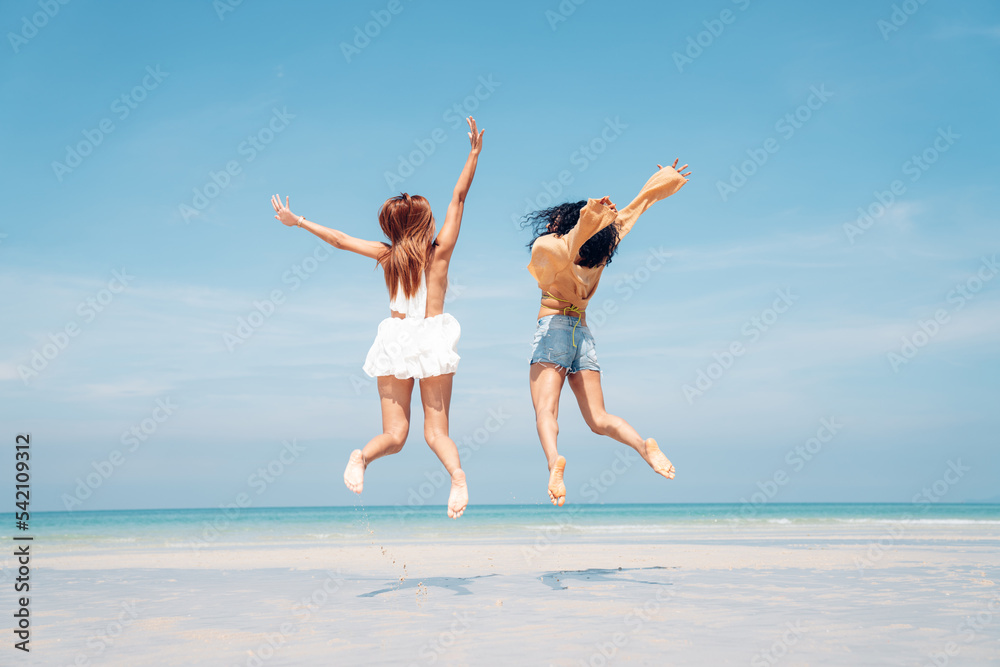 Happy girl jumping on the beach, Beach summer holiday sea people concept