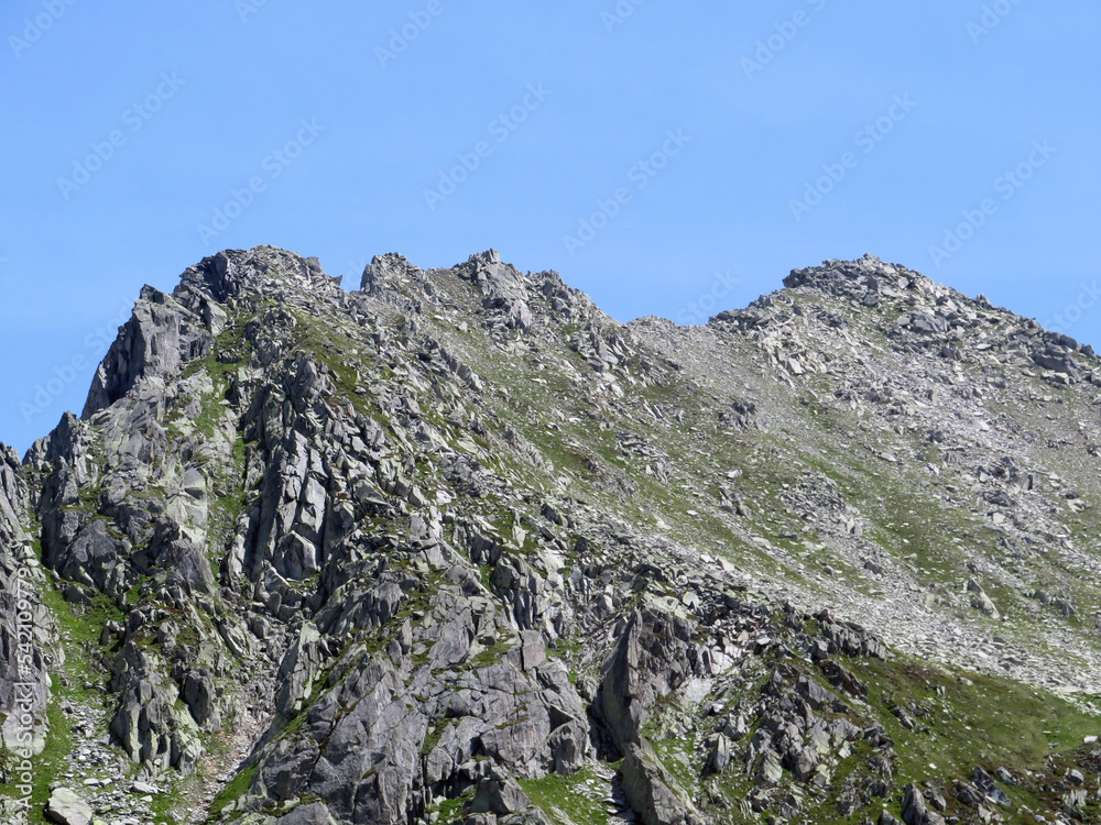 The Monte Prosa peak (2737 m) in the massif of the Swiss Alps and in the area of the mountain St. Gotthard Pass (Gotthardpass), Airolo - Canton of Ticino (Tessin), Switzerland (Schweiz)
