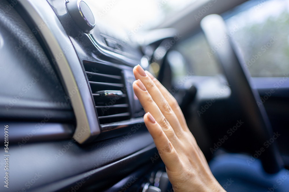 Close-up of hands checking car air conditioner, Car cooling system. Close-up of hands checking car air conditioner, Car cooling system.