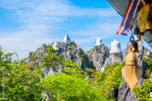 Wat Praputthabaht Sudthawat pu pha daeng, Wat Chaloem Phra Kiat Phrachomklao Rachanusorn. There is a pagoda built on a high rocky mountain by belief and faith. Unseen Thailand, Lampang, Thailand.
