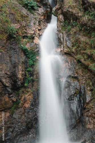 Landscape of beautiful waterfall on high mountain.