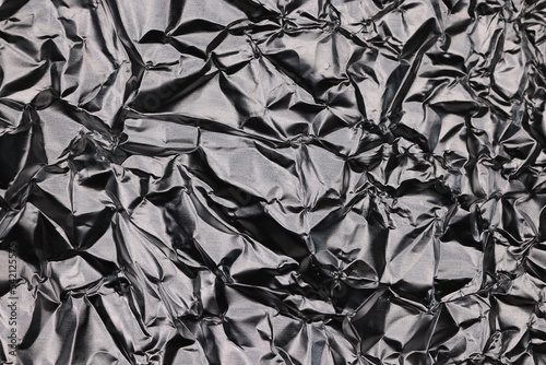 crumpled foil abstract background black and white silver effect