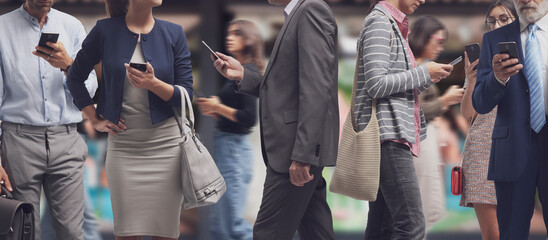 Crowd of people using smartphones