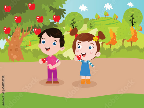 Children eating apple fruit at the garden