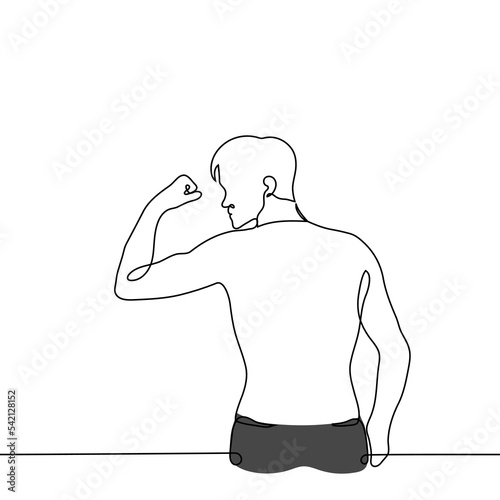 muscular shirtless man stands with his back to the viewer and demonstrates the muscles on his arm - one line drawing vector. concept athlete topless, handsome man shows off his body