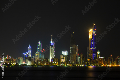 Night in Kuwait City Scape Landscape Panorama with a light in the Building.