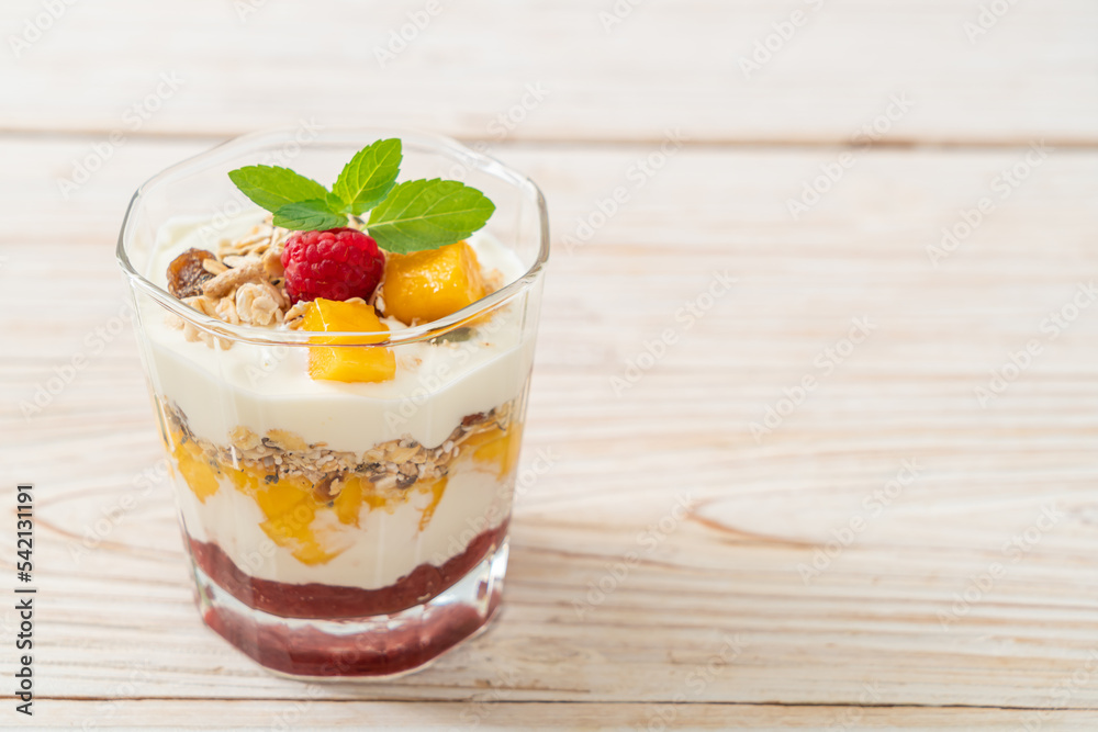 homemade mango and raspberry with yogurt and granola homemade mango and raspberry with yogurt and granola