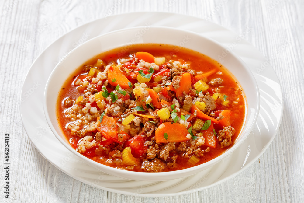 Hamburger Soup with barley and vegetables in bowl