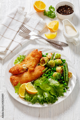 Crispy Beer Batter Cod Fish with green vegetables