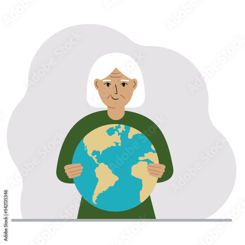 A woman deposits the planet Earth in his hand. Earth day holiday concept  saving the planet  global warming or climate change.