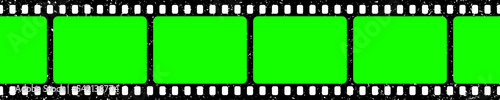 Realistic grunge film strip, camera roll. Old retro cinema movie strip with blank green chroma key background. Analog video recording and photography. Visual effects compositing. Vector illustration